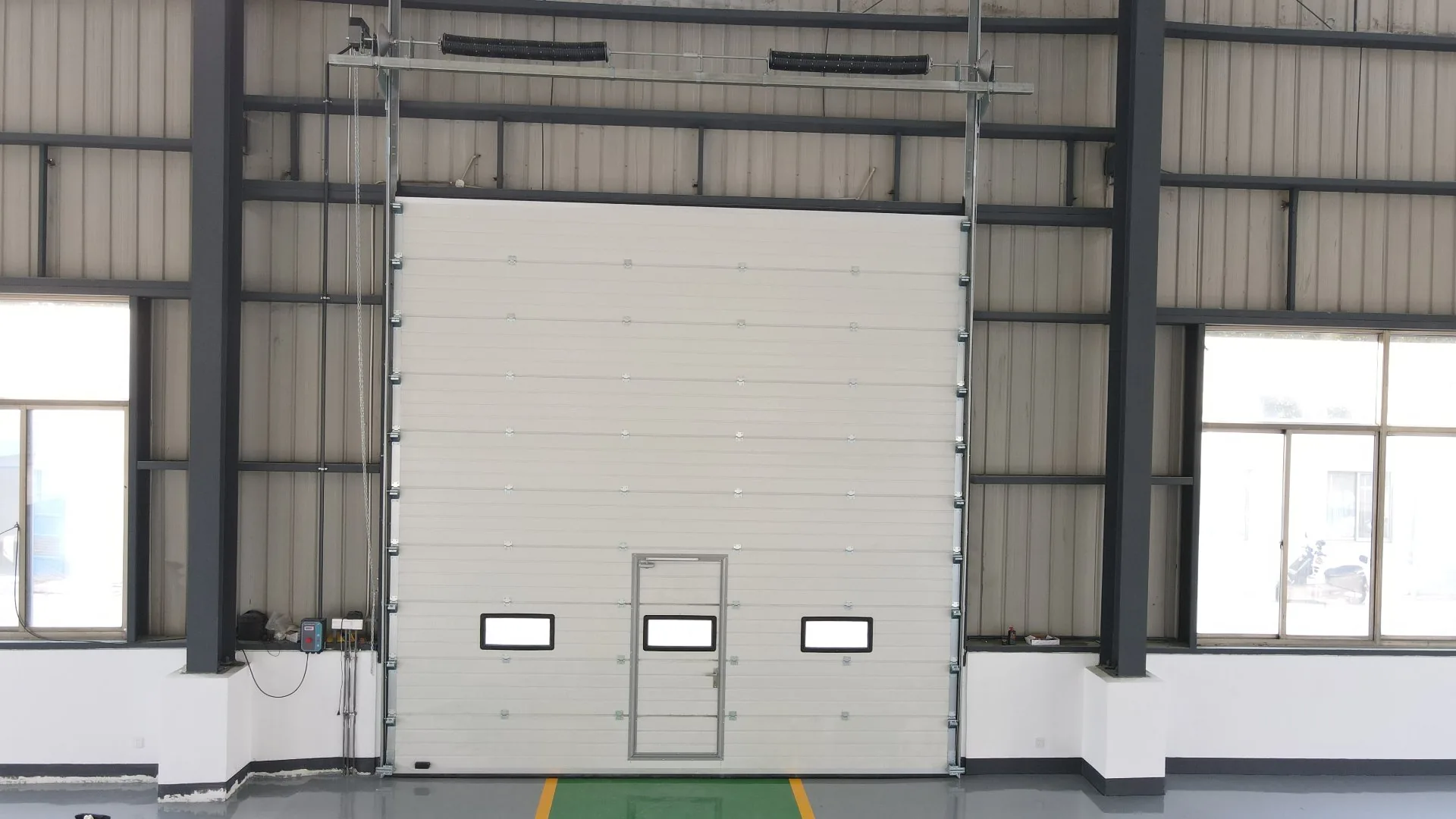 Industrial Lifting Door with wicket door
